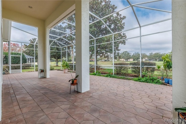 1095 W Skyview Landings Dr, Hernando, FL 34442 - view of patio / terrace featuring glass enclosure and a water view