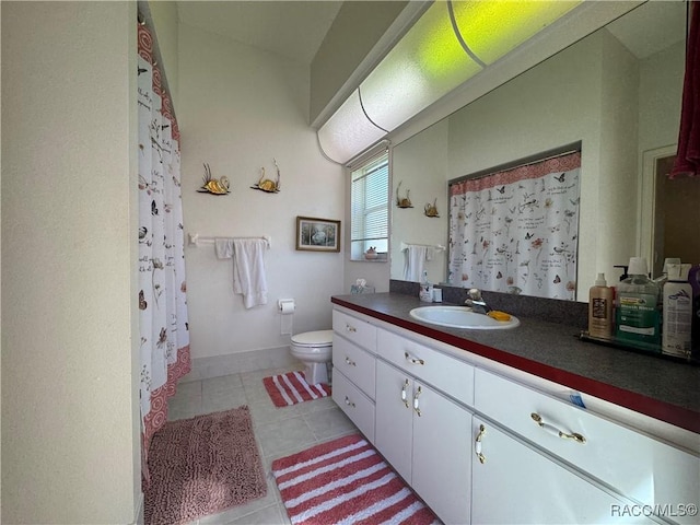 full bath with vanity, tile patterned floors, toilet, and a shower with curtain