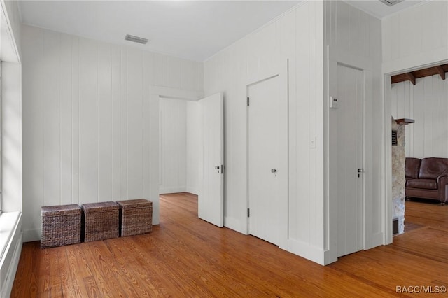 3184 N Edward Island Pt, Hernando, FL 34442 - unfurnished bedroom with a fireplace, wood finished floors, and a closet