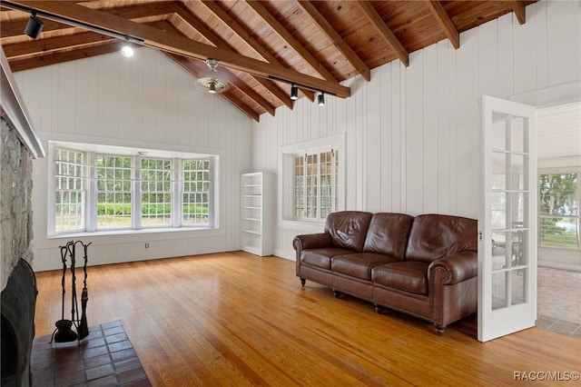 3184 N Edward Island Pt, Hernando, FL 34442 - living area featuring hardwood / wood-style floors, wood ceiling, wooden walls, and track lighting