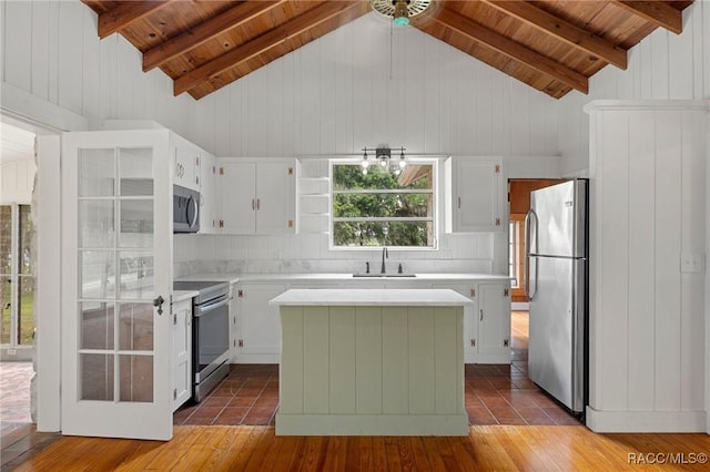 3184 N Edward Island Pt, Hernando, FL 34442 - kitchen featuring appliances with stainless steel finishes, wooden ceiling, light countertops, a sink, and hardwood / wood-style floors