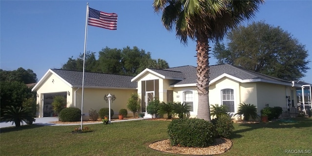 ranch-style house with a front yard and a garage