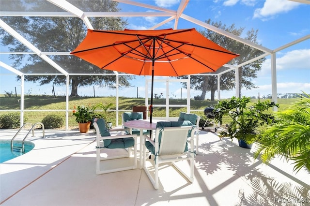 view of patio with a lanai