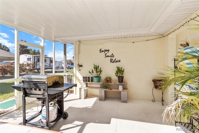 sunroom / solarium featuring plenty of natural light