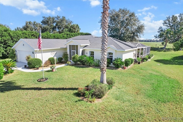 ranch-style home featuring a lanai, a front lawn, and a garage