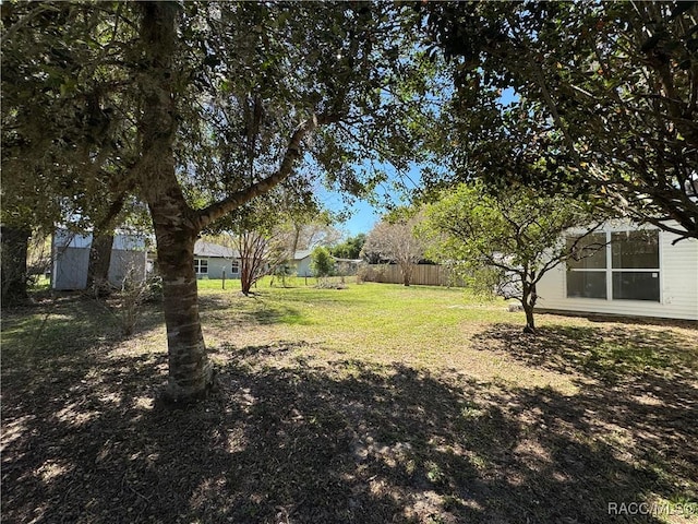 view of yard featuring fence