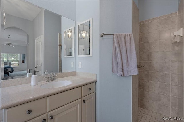 4198 N Longvalley Rd, Hernando, FL 34442 - ensuite bathroom with a tile shower, vanity, a ceiling fan, and ensuite bath