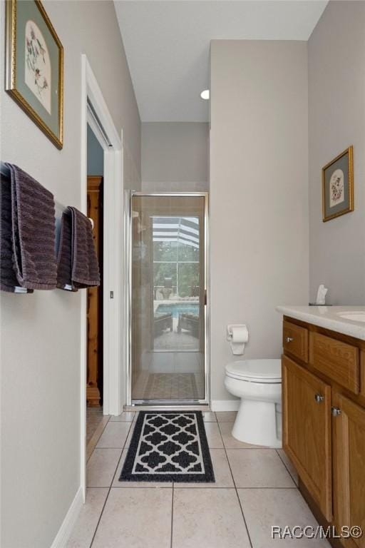 4198 N Longvalley Rd, Hernando, FL 34442 - full bath with a stall shower, baseboards, toilet, tile patterned floors, and vanity