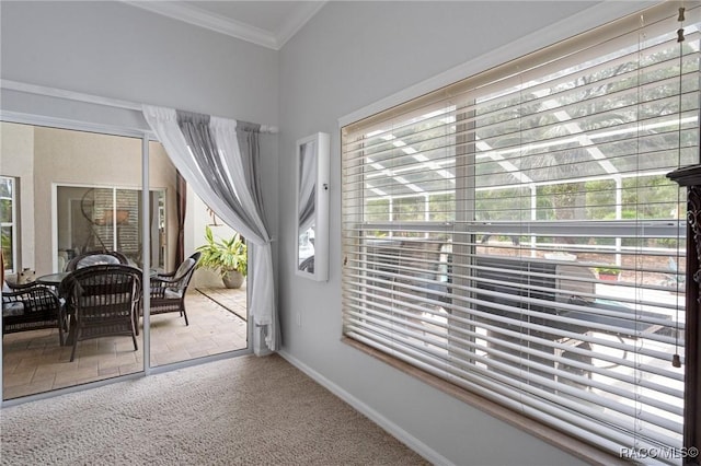 4198 N Longvalley Rd, Hernando, FL 34442 - entryway featuring baseboards, ornamental molding, a healthy amount of sunlight, and carpet floors