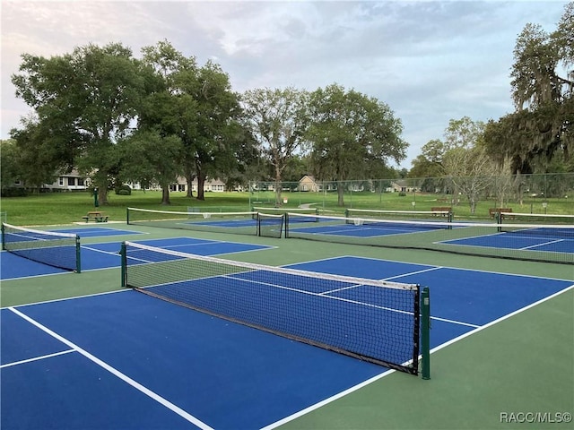 view of sport court with fence