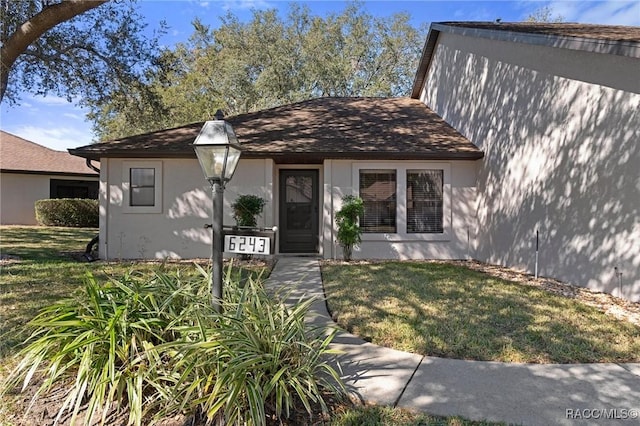 view of front of house with a front yard