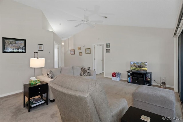 living room featuring ceiling fan, light colored carpet, and vaulted ceiling