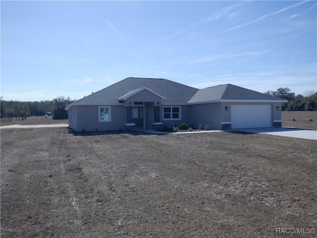 ranch-style house with a garage