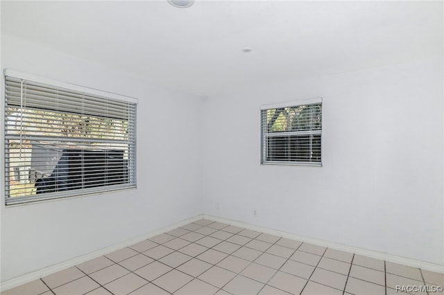 view of tiled spare room