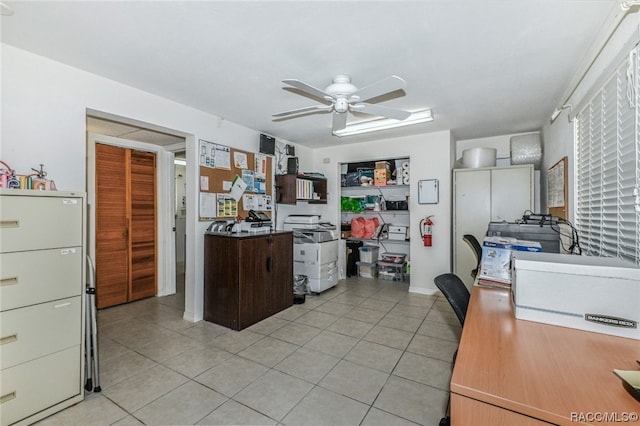 kitchen with ceiling fan and light tile patterned floors