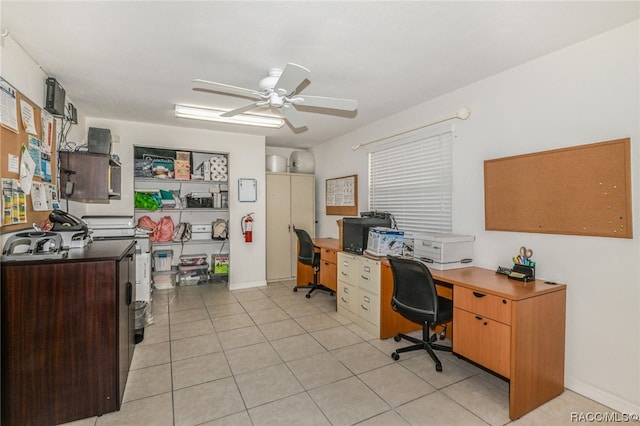 tiled office space with ceiling fan