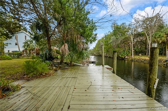 view of dock with a water view