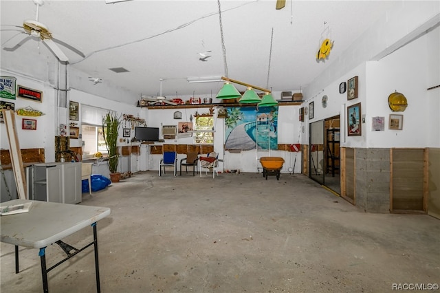 garage with ceiling fan