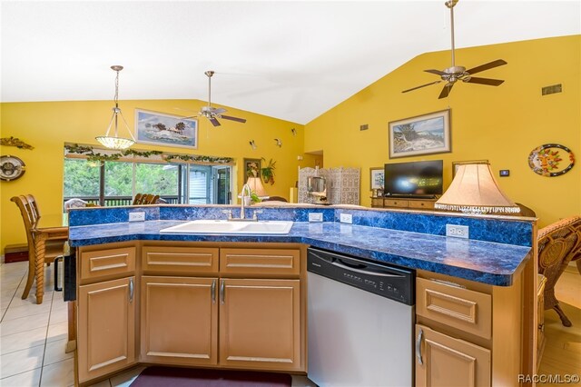 kitchen with a kitchen island with sink, sink, stainless steel dishwasher, and vaulted ceiling