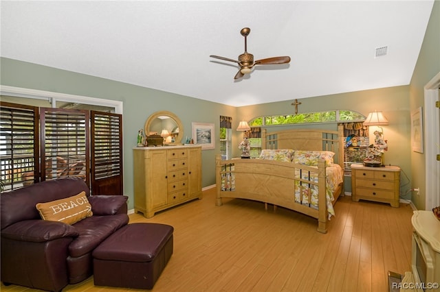 bedroom with ceiling fan and light wood-type flooring