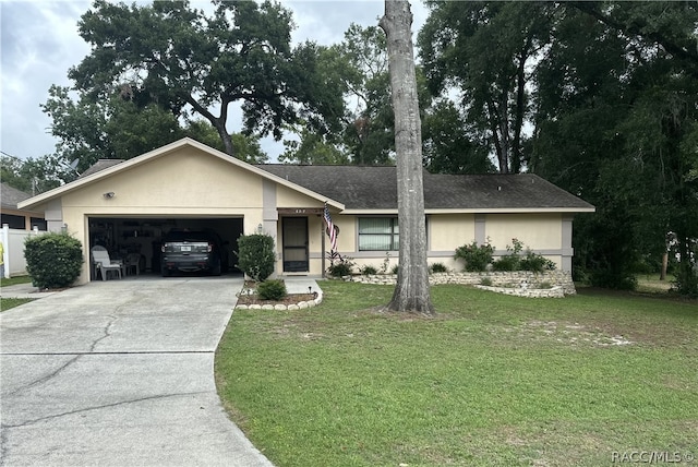 single story home with a garage and a front yard