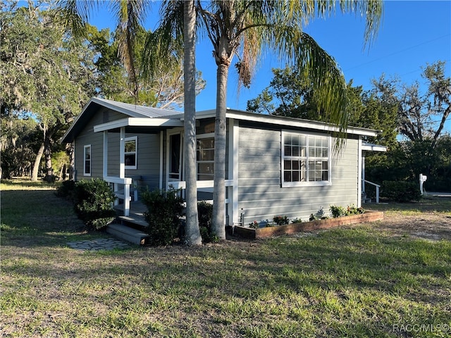 view of front of house with a front yard