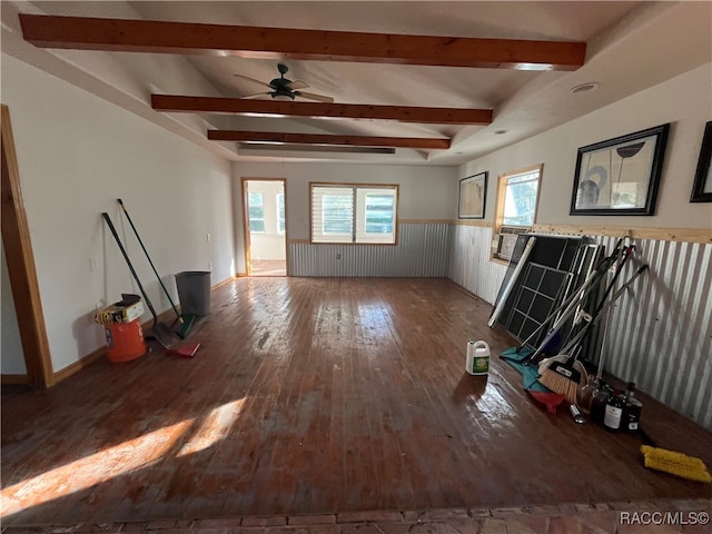 interior space featuring hardwood / wood-style flooring, ceiling fan, and beam ceiling