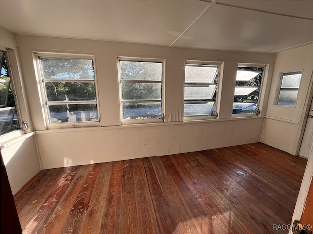 unfurnished sunroom featuring plenty of natural light