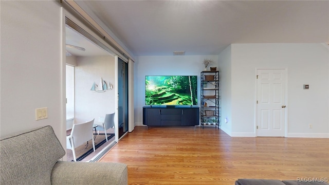 unfurnished living room featuring light wood-type flooring