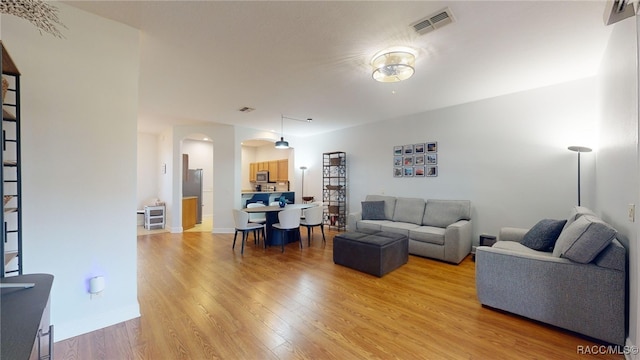 living room with light wood-type flooring