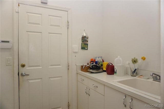 bar featuring a sink