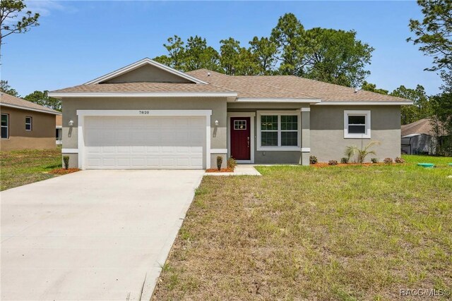 7820 N Sarazen Dr, Citrus Springs, FL 34434 - ranch-style home with stucco siding, a garage, concrete driveway, a front lawn, and roof with shingles