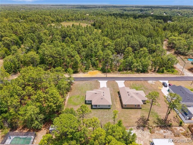 7820 N Sarazen Dr, Citrus Springs, FL 34434 - bird's eye view of a heavily wooded area