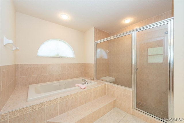 full bath featuring a shower stall, tile patterned floors, a bath, and recessed lighting