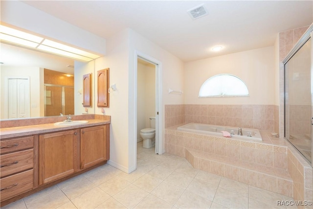 bathroom featuring a shower stall, a bath, vanity, visible vents, and tile patterned floors
