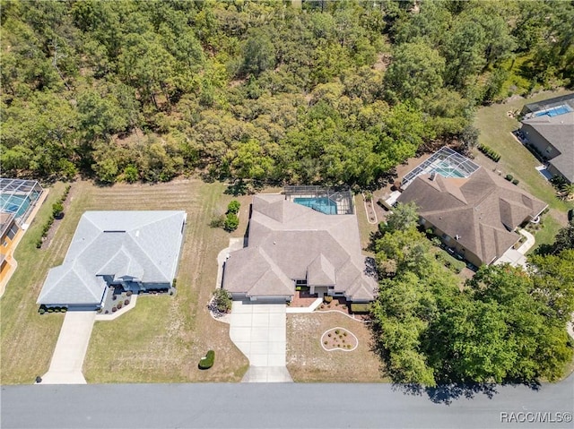 aerial view featuring a view of trees