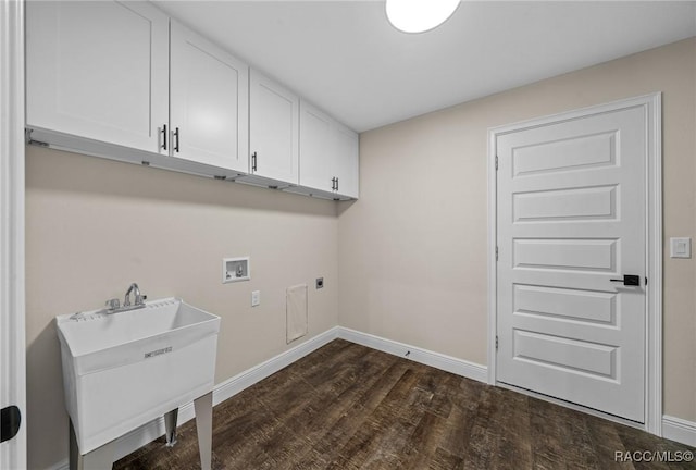 washroom with sink, dark wood-type flooring, electric dryer hookup, cabinets, and washer hookup