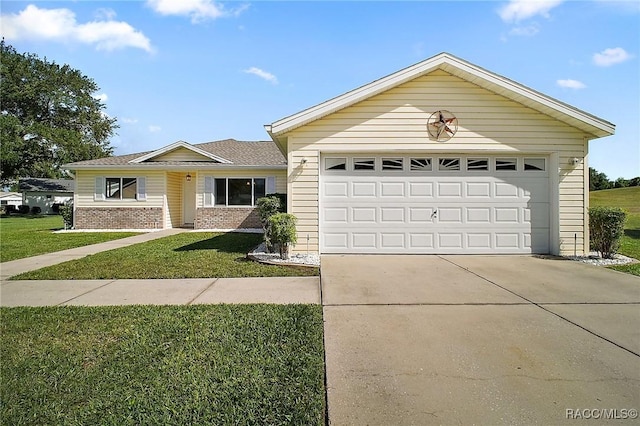single story home featuring a front yard, brick siding, and concrete driveway