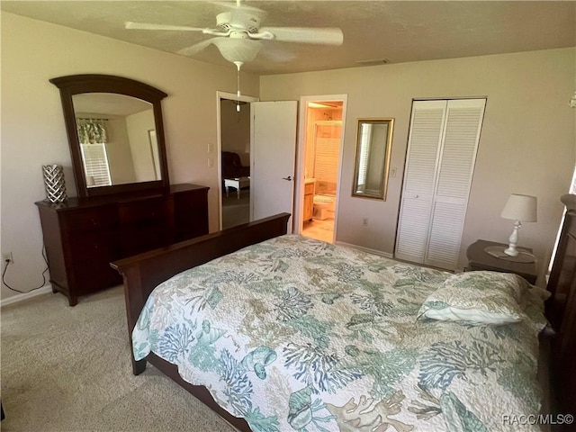 715 E Hartford St Unit 4A, Hernando, FL 34442 - bedroom with light colored carpet, a closet, ceiling fan, connected bathroom, and baseboards