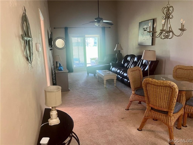 715 E Hartford St Unit 4A, Hernando, FL 34442 - carpeted living room with a chandelier and a ceiling fan
