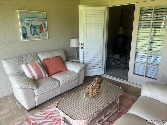 715 E Hartford St Unit 4A, Hernando, FL 34442 - living room featuring a textured wall