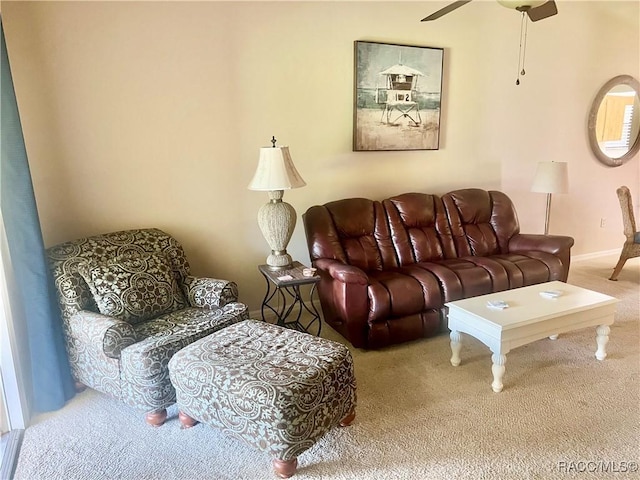 715 E Hartford St Unit 4A, Hernando, FL 34442 - living area with carpet floors, a ceiling fan, and baseboards