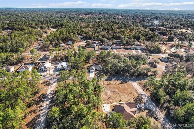 bird's eye view with a residential view and a forest view