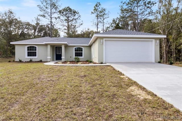 ranch-style house featuring a garage and a front lawn