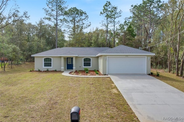 ranch-style home with a garage and a front yard