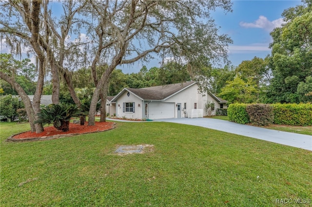 single story home with a garage and a front yard