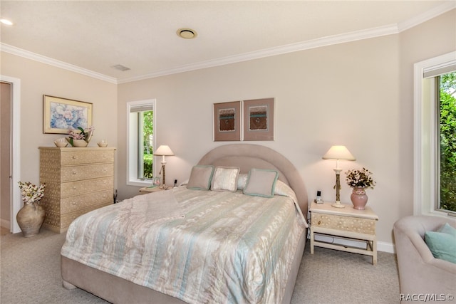 carpeted bedroom with crown molding