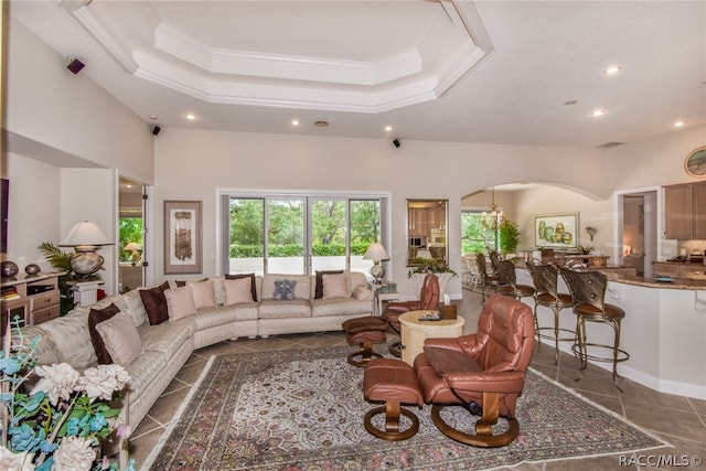 tiled living room with ornamental molding