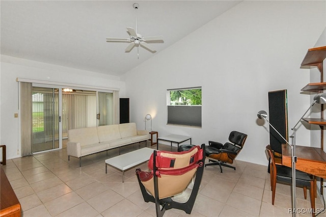 living room with ceiling fan, light tile patterned flooring, and high vaulted ceiling