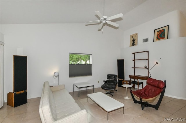 living room with high vaulted ceiling, light tile patterned floors, and ceiling fan